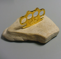 Tirapugni in acciaio temprato teflonato gold Mod.Sk-41